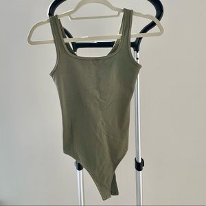Abercrombie green seamless ribbed bodysuit. Snap thong closure.